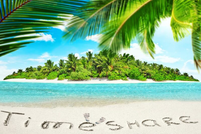 Adobe Stock royalty-free image #138932338, 'Whole tropical island within atoll in tropical Ocean and inscription "TimeShare" in the sand on a tropical island, Maldives.' uploaded by BRIAN_KINNEY, standard license purchased from https://stock.adobe.com/images/download/138932338; file retrieved on August 20th, 2019. License details available at https://stock.adobe.com/license-terms - image is licensed under the Adobe Stock Standard License