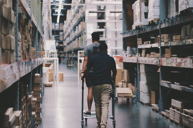 Photo by Alexander Isreb: https://www.pexels.com/photo/men-going-around-a-warehouse-1797428/