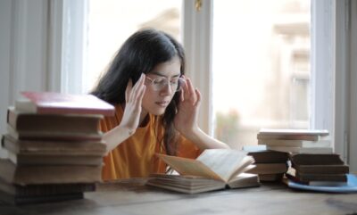 Photo by Andrea Piacquadio: https://www.pexels.com/photo/a-weary-female-student-having-a-headache-3808057/