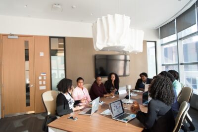 Photo by Christina Morillo: https://www.pexels.com/photo/people-sitting-around-brown-wooden-table-under-white-pendant-lamp-inside-room-1181435/