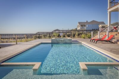 Photo by Pixabay: https://www.pexels.com/photo/architecture-hotel-pool-poolside-261327/