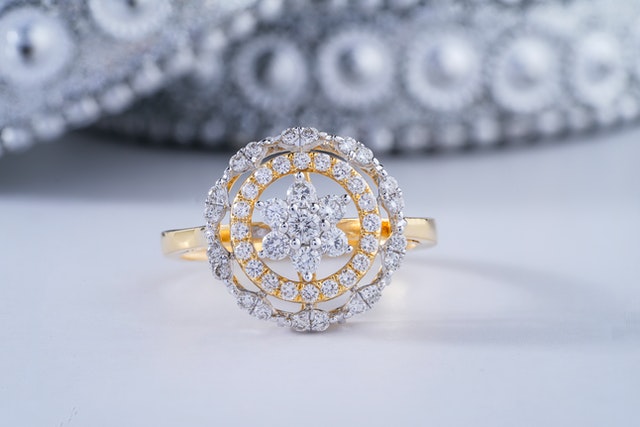 Photo by The glorious studio : https://www.pexels.com/photo/a-close-up-shot-of-a-diamond-ring-6993818/