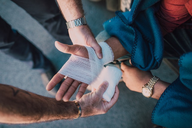 Photo by RODNAE Productions: https://www.pexels.com/photo/person-applying-bandage-on-another-person-s-hand-6519905/