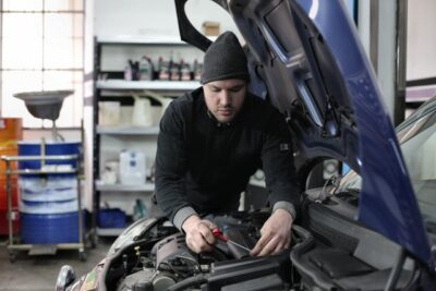 Photo by Andrea Piacquadio: https://www.pexels.com/photo/man-in-black-jacket-and-black-knit-cap-standing-near-vehicle-3807329/