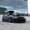 Photo by Garvin St. Villier: https://www.pexels.com/photo/modern-sport-car-with-rack-on-top-parked-on-pavement-4169087/