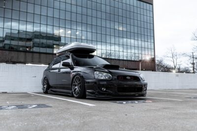 Photo by Garvin St. Villier: https://www.pexels.com/photo/modern-sport-car-with-rack-on-top-parked-on-pavement-4169087/