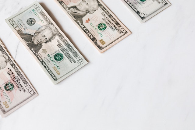 Photo by Karolina Grabowska: https://www.pexels.com/photo/set-of-various-dollar-banknotes-on-white-table-4386451/