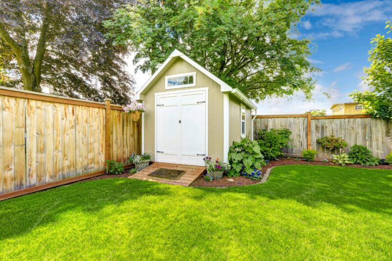 Adobe Stock royalty-free image #70743990, 'Fenced backyard with small shed' uploaded by Iriana Shiyan, standard license purchased from https://stock.adobe.com/images/download/70743990; file retrieved on August 25th, 2019. License details available at https://stock.adobe.com/license-terms - image is licensed under the Adobe Stock Standard License