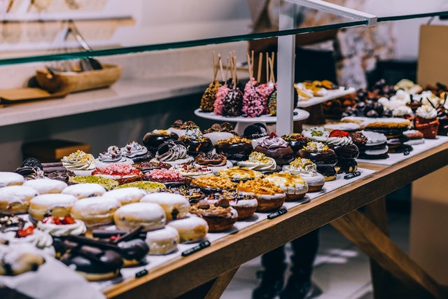 Photo by Igor Ovsyannykov: https://www.pexels.com/photo/donuts-and-bagel-display-205961/