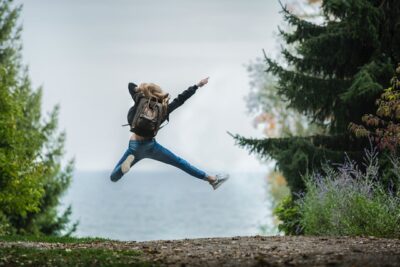 Photo by Sebastian Voortman: https://www.pexels.com/photo/woman-jumping-wearing-green-backpack-214574/