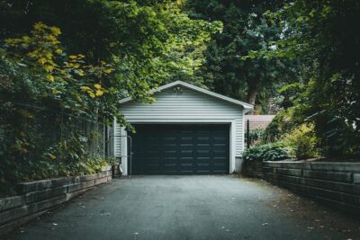 Photo by Jonathan Cooper: https://www.pexels.com/photo/photo-of-a-garage-with-a-black-door-9472574/