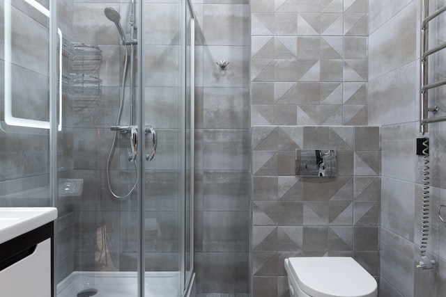 Photo by Max Vakhtbovych: https://www.pexels.com/photo/modern-shower-room-interior-with-toilet-bowl-at-home-6436779/