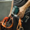 Photo by Allan Mas: https://www.pexels.com/photo/crop-repairman-standing-with-working-screwdriver-and-orange-helmet-5383809/