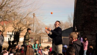 Photo by Gastón Mousist: https://www.pexels.com/photo/a-man-juggling-in-front-of-children-13025127/