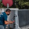 Photo by José Andrés Pacheco Cortes: https://www.pexels.com/photo/man-checking-an-air-conditioner-5463575/