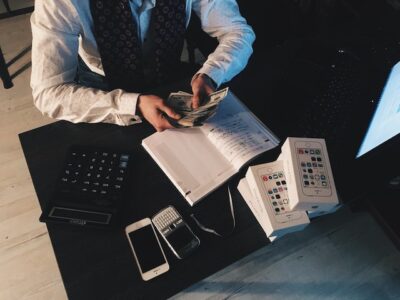 Photo by Kuncheek: https://www.pexels.com/photo/accountant-counting-money-210990/