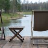 Photo by Maria Tsegelnik: https://www.pexels.com/photo/brown-wooden-folding-chair-and-table-near-body-of-water-12236090/