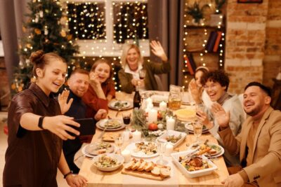 Photo by Nicole Michalou : https://www.pexels.com/photo/family-celebrating-christmas-dinner-while-taking-selfie-5778899/