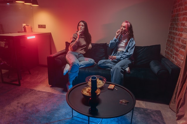 Photo by Pavel Danilyuk: https://www.pexels.com/photo/friends-smoking-together-while-sitting-on-the-couch-8550949/