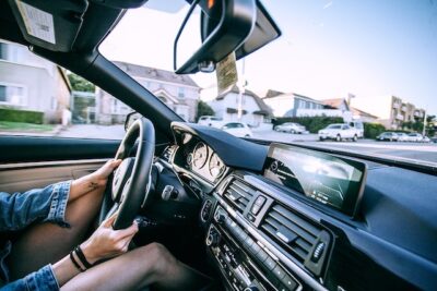 Photo by Maria Orlova: https://www.pexels.com/photo/anonymous-woman-driving-car-in-town-4969878/