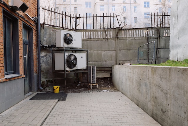 Photo by ready made: https://www.pexels.com/photo/air-conditioning-system-on-street-in-yard-3964692/