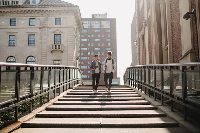 Photo by Armin Rimoldi: https://www.pexels.com/photo/friends-going-downstairs-in-city-district-in-sunny-day-5553024/