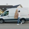 Photo by Artem Podrez: https://www.pexels.com/photo/man-carrying-boxes-beside-a-van-5025669/