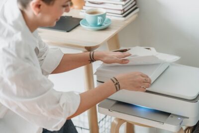 Photo by George Milton: https://www.pexels.com/photo/woman-preparing-paper-for-printing-photos-7014408/