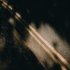 Photo by Harry Cooke: https://www.pexels.com/photo/asphalt-road-with-marking-lines-near-soil-and-shadows-6195088/