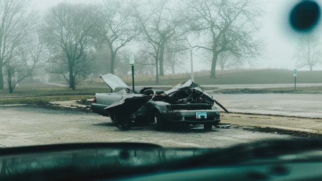 Photo by Karl Solano: https://www.pexels.com/photo/a-broken-car-parked-outside-4048602/