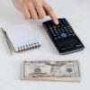Photo by Karolina Grabowska: https://www.pexels.com/photo/crop-unrecognizable-accountant-using-calculator-near-pile-of-american-dollars-4386322/