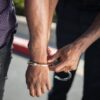 Photo by Kindel Media: https://www.pexels.com/photo/police-officer-putting-handcuffs-on-another-person-7714795/