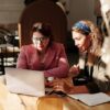 Photo by Marcus Aurelius: https://www.pexels.com/photo/woman-in-red-knit-sweater-sitting-by-the-table-4063788/