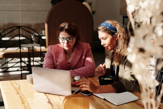 Photo by Marcus Aurelius: https://www.pexels.com/photo/woman-in-red-knit-sweater-sitting-by-the-table-4063788/