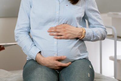 Photo by MART PRODUCTION: https://www.pexels.com/photo/photo-of-person-holding-her-stomach-7088480/