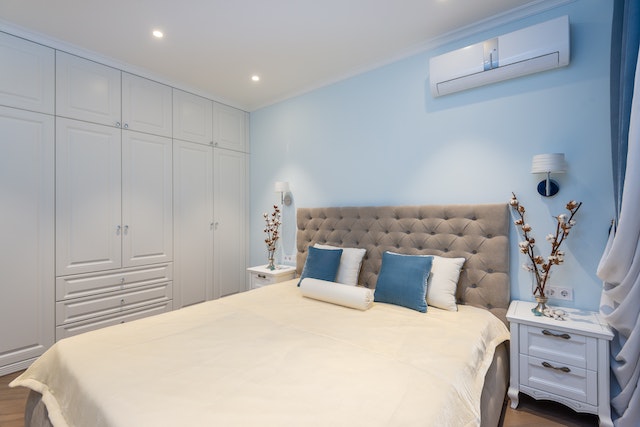 Photo by Max Vakhtbovych: https://www.pexels.com/photo/comfortable-bed-and-white-big-wardrobe-in-elegant-bedroom-7166557/