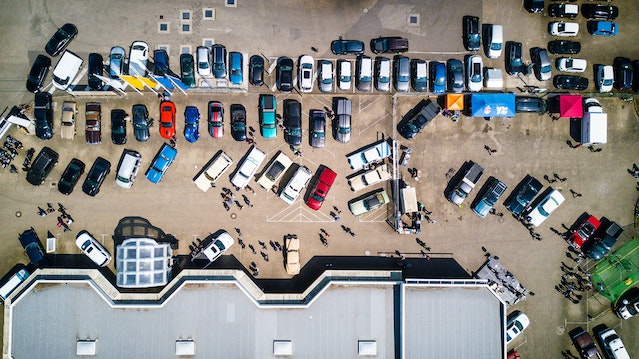 Photo by Stephan Müller: https://www.pexels.com/photo/high-angle-photo-of-vehicles-parked-near-building-753876/