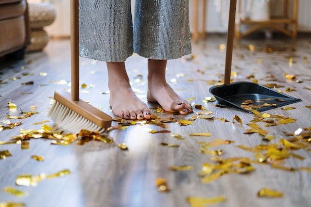 Photo by cottonbro studio: https://www.pexels.com/photo/woman-in-gray-dress-standing-on-brown-wooden-floor-4684372/