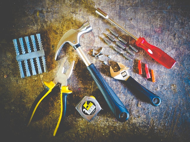 Photo by energepic.com: https://www.pexels.com/photo/tool-set-on-plank-175039/