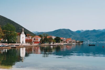 Photo by Maria Orlova: https://www.pexels.com/photo/coastal-village-on-peaceful-hilly-lake-shore-4906298/