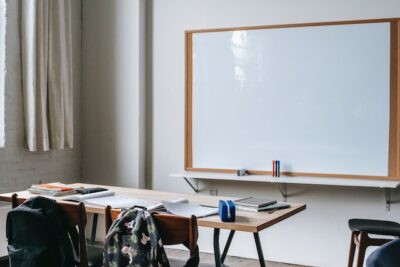 Photo by Katerina Holmes: https://www.pexels.com/photo/school-bench-with-stationery-in-classroom-5905445/