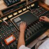 Photo by Anna Pou from Pexels: https://www.pexels.com/photo/high-angle-view-of-a-man-using-a-sound-mixer-8133251/