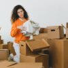 Photo by SHVETS production: https://www.pexels.com/photo/focused-young-relocating-female-packing-belonging-into-cardboard-boxes-7203815/