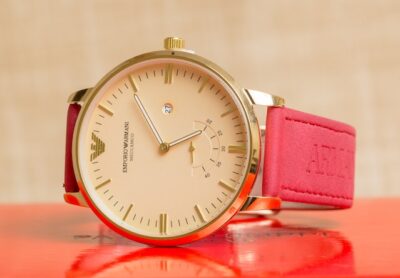 Photo by Antony Trivet: https://www.pexels.com/photo/an-emporio-armani-wristwatch-on-red-surface-9878687/
