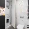 Photo by Max Rahubovskiy: https://www.pexels.com/photo/bathroom-interior-with-washing-machine-against-toilet-bowl-6980663/