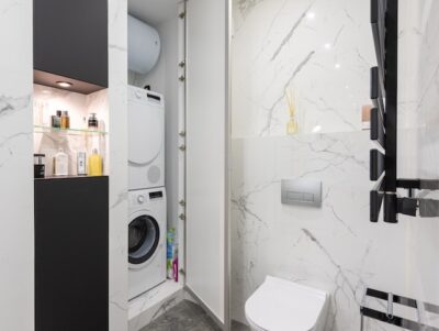 Photo by Max Rahubovskiy: https://www.pexels.com/photo/bathroom-interior-with-washing-machine-against-toilet-bowl-6980663/